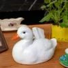 Boîte à mouchoirs décorative en forme de canard, parfaite pour un intérieur champêtre ou une ambiance chaleureuse.