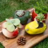 Pot de fleur en céramique en forme de fruit, idéal pour les plantes grasses ou succulentes d'intérieur.