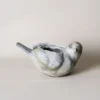 Jardinière en forme d'oiseau vide, idéale comme pot de fleur intérieur au style rustique.
